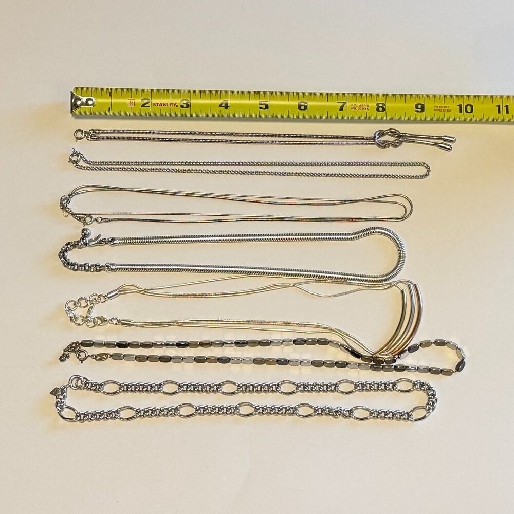 8 Assorted Silver Necklaces